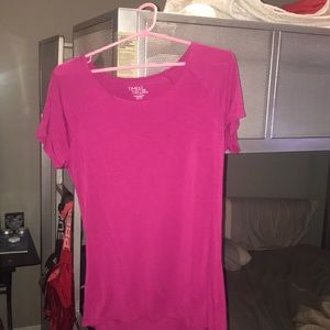This is a Time and Tru brand pink t-shirt.